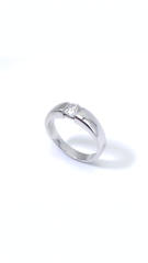 Half carat diamond in tension setting engagement ring